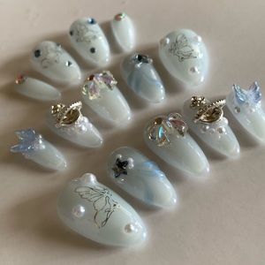 Korean Style Milky White and Frosty Blue Almond Fairy Nails